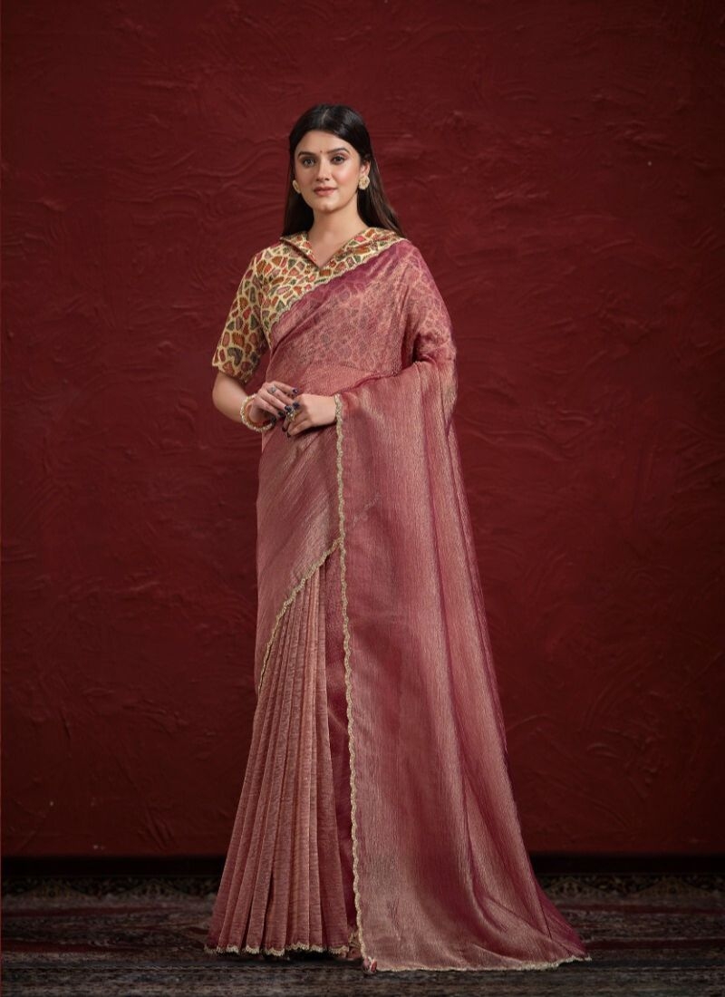 Stunning embroidered silk saree in nude pink