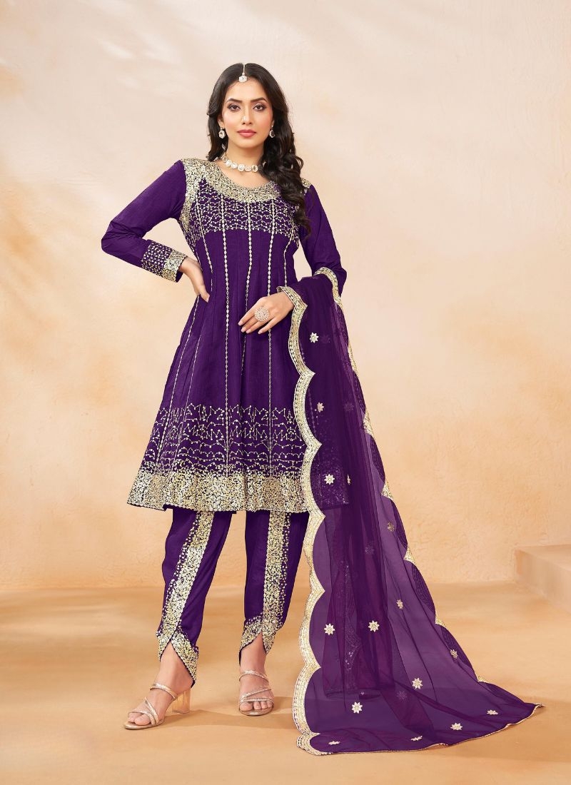 Stunning embroidered silk salwar suit in purple