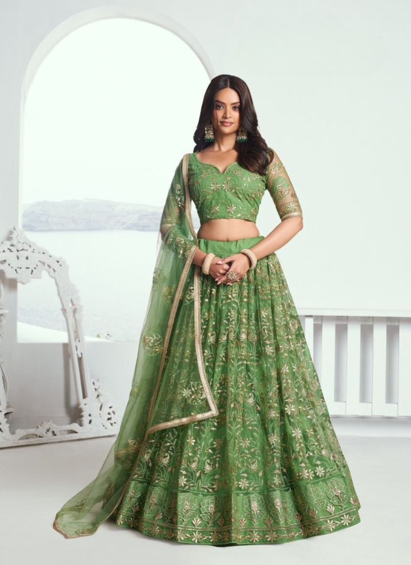 Beautiful designer butterfly net lehenga choli in green