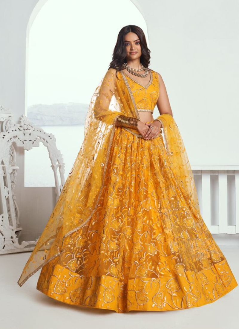 Beautiful designer butterfly net lehenga choli in yellow