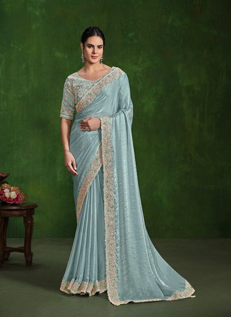 Exquisite handwork embroidered satin silk saree in light blue