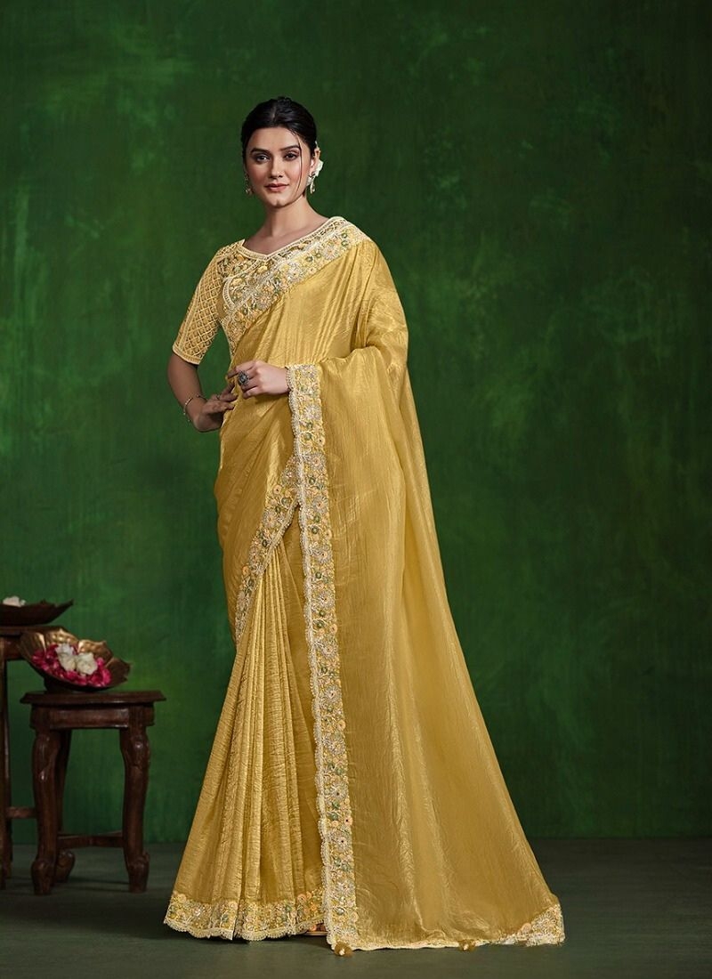 Exquisite handwork embroidered satin silk saree in yellow