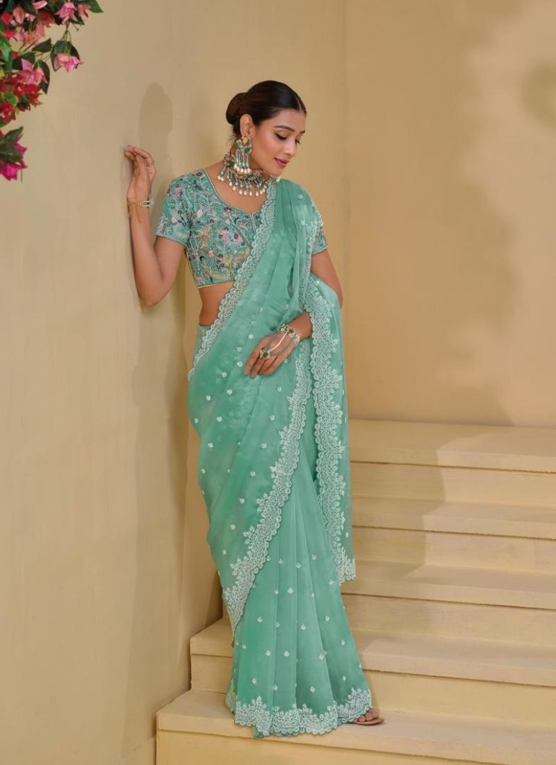 Stunning Heavy embroidered pure silk saree in green