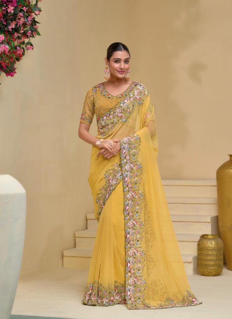 Stunning Heavy embroidered pure silk saree in yellow