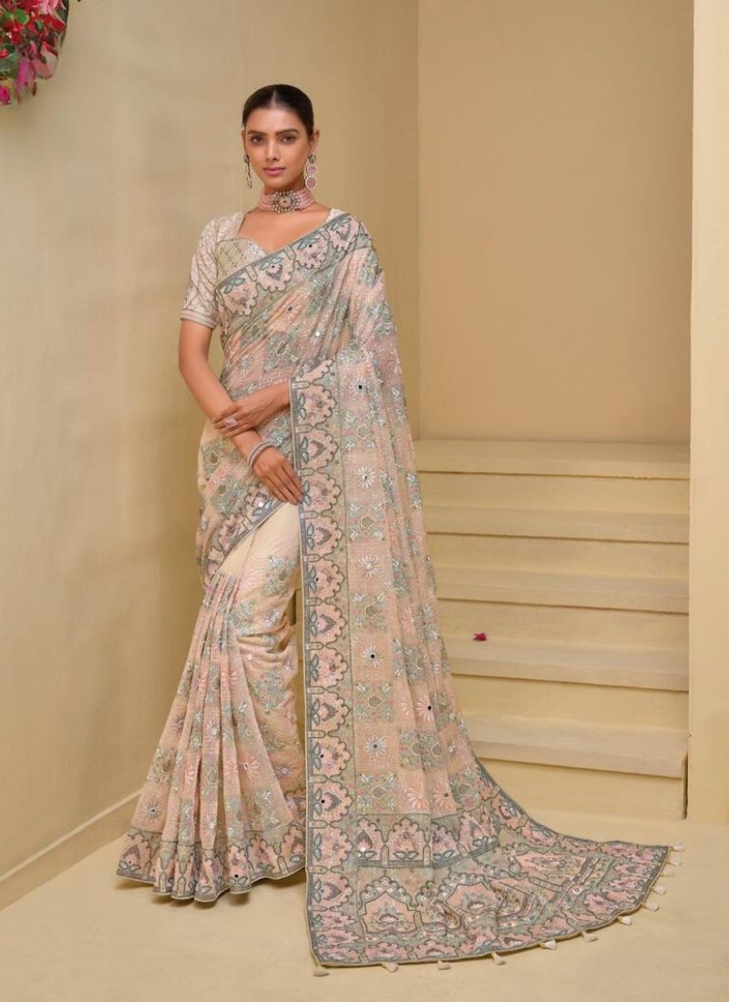 Stunning Heavy embroidered pure silk saree in cream