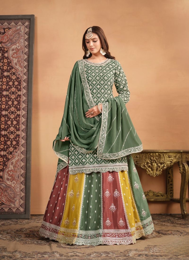 Beautiful heavy embroidered Chinon sharara suit in dark green