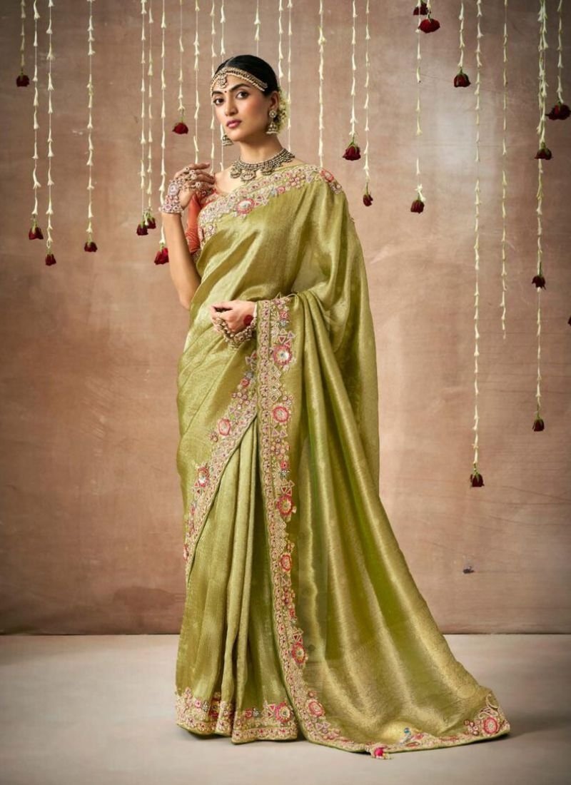 Exquisite thread embroidered Dola silk saree in light green