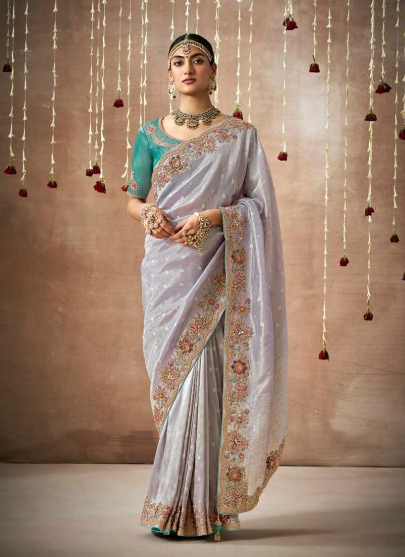 Exquisite thread embroidered Dola silk saree in grey