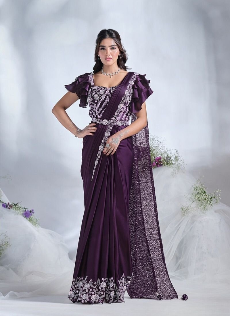 Designer thread and stone embroidered silk saree in purple