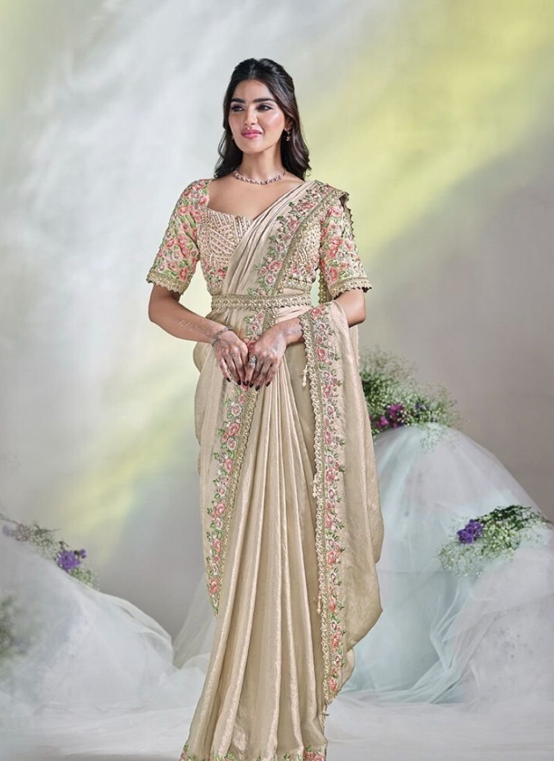 Designer thread and stone embroidered silk saree in beige