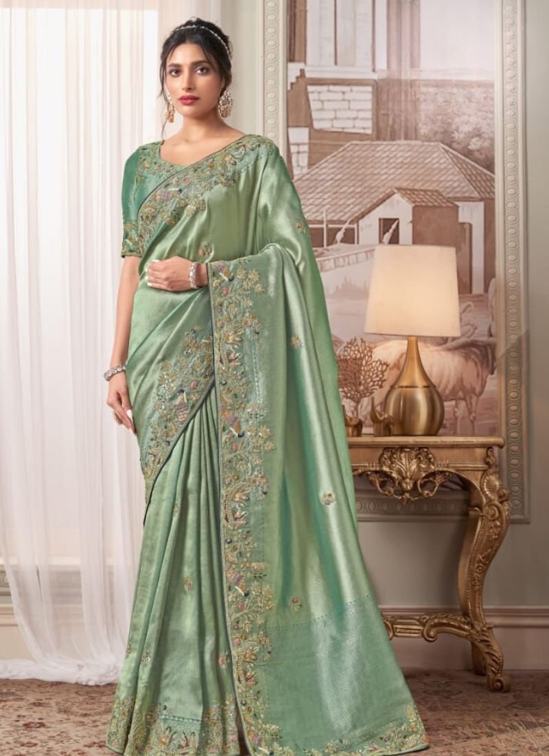 Beautiful embroidered organza silk saree in light green