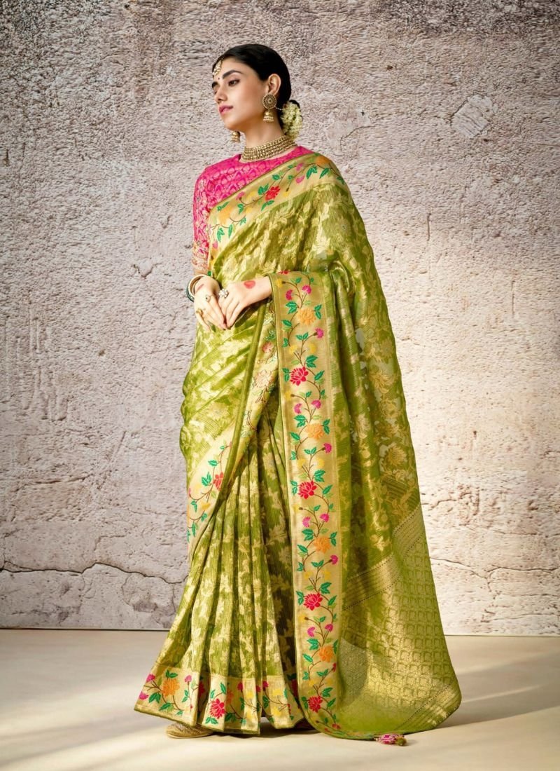 Stunning heavy embroidered banarasi silk saree in light green