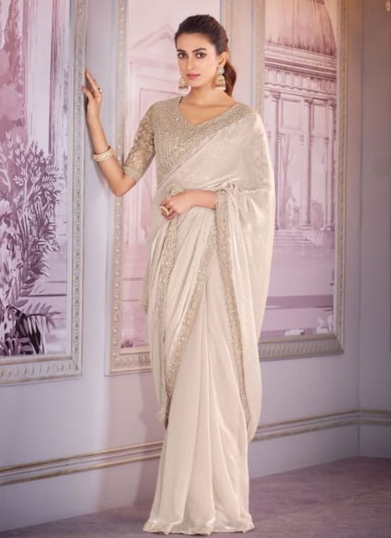 Exquisite embroidered satin organza saree in cream