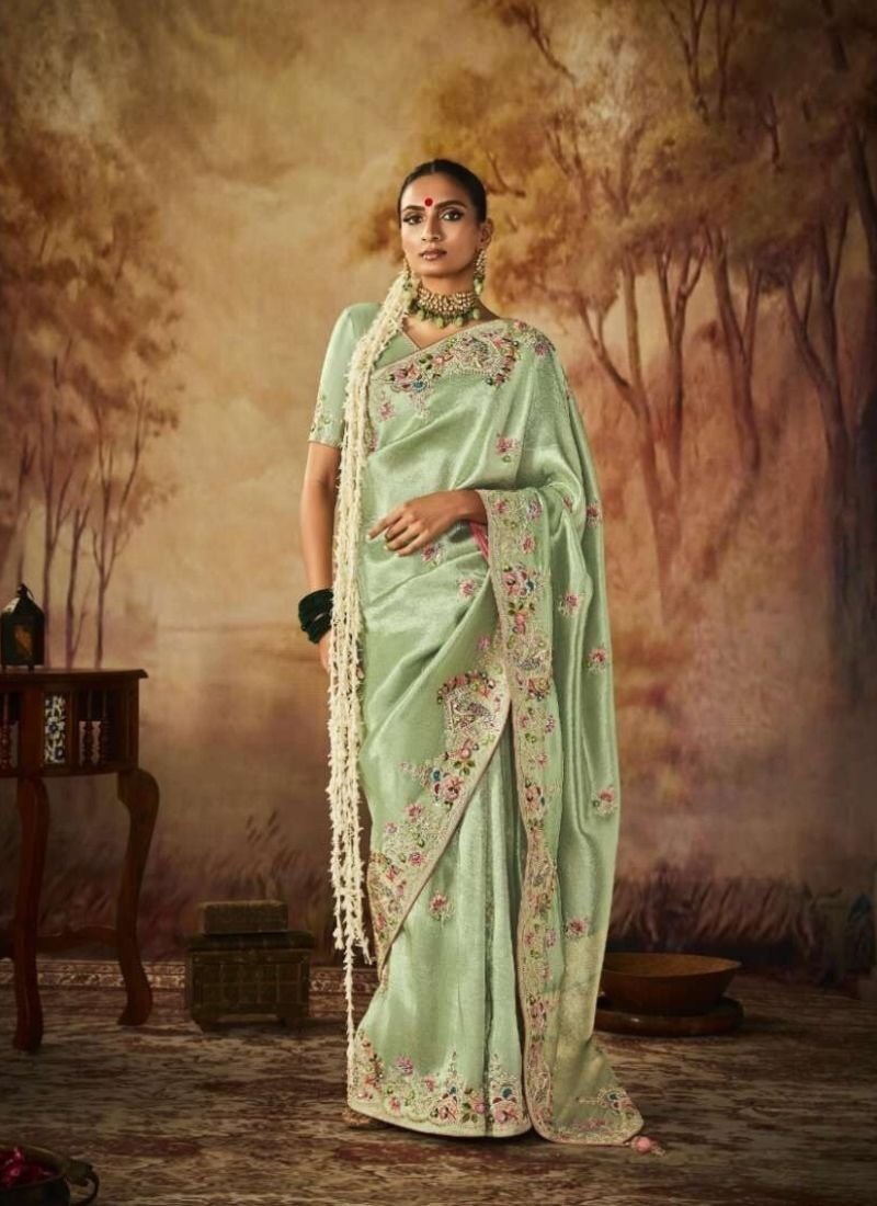 Stylish heavy coding embroidered silk saree in light green