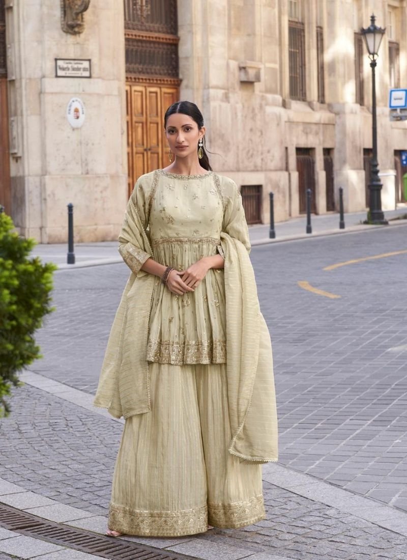 Stunning heavy embroidered sharara suit in cream