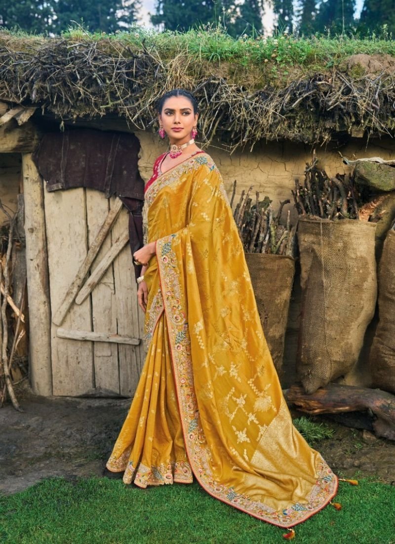 Beautiful hand embroidered organza silk saree in mustard