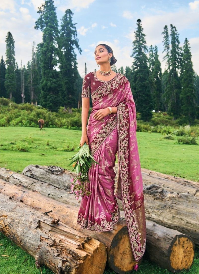 Beautiful hand embroidered organza silk saree in maroon