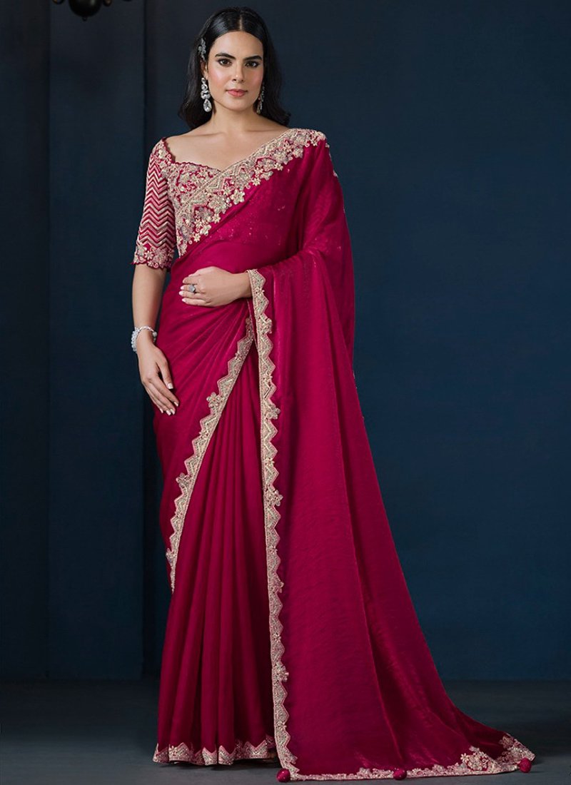 Exquisite hand embroidered silk saree in magenta