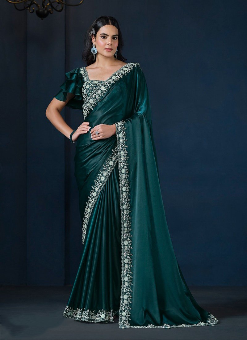 Exquisite hand embroidered silk saree in dark green