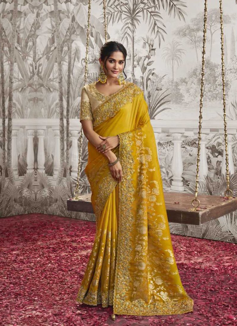 Beautiful embroidered georgette saree in yellow