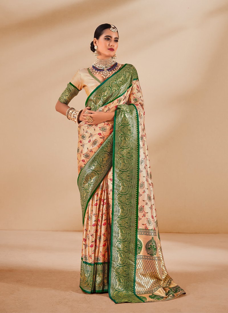 Stunning zari weaving tissue silk saree in green