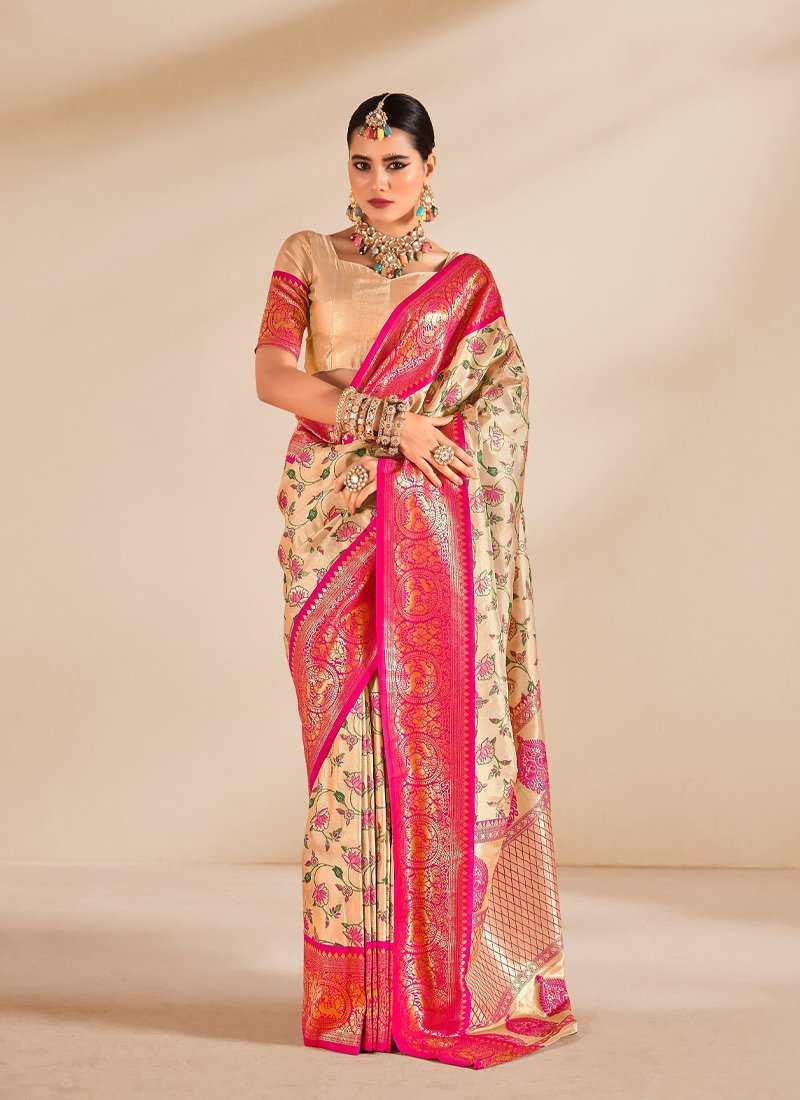 Stunning zari weaving tissue silk saree in peach pink