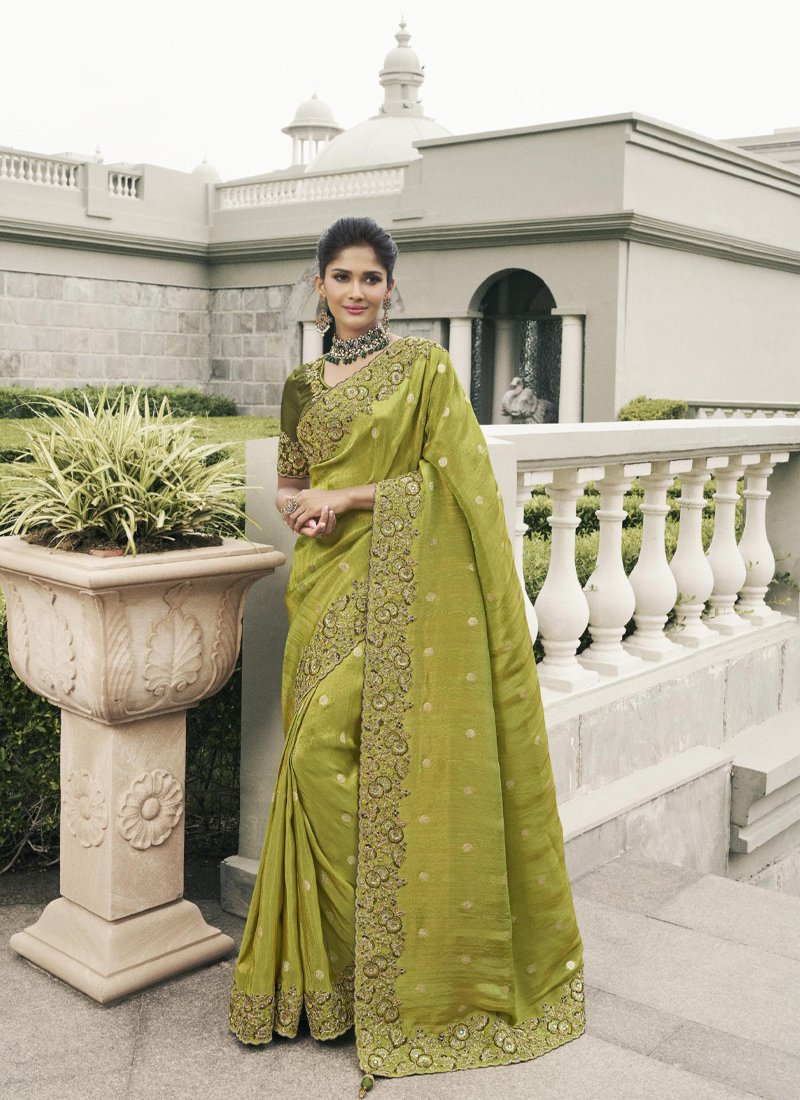 Stylish zari woven tissue silk saree in mehandi green