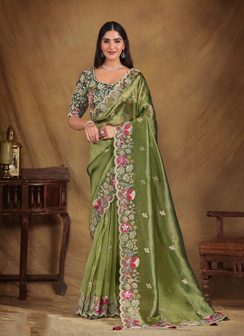 Exquisite mirror embroidered organza silk saree in dark green