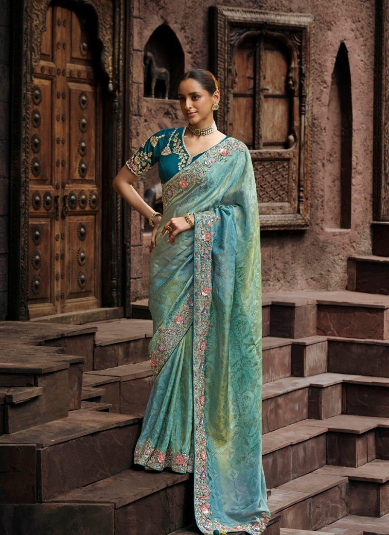 Designer zari embroidered viscose tissue saree in sky blue