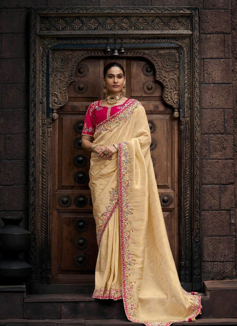 Designer zari embroidered viscose tissue saree in cream