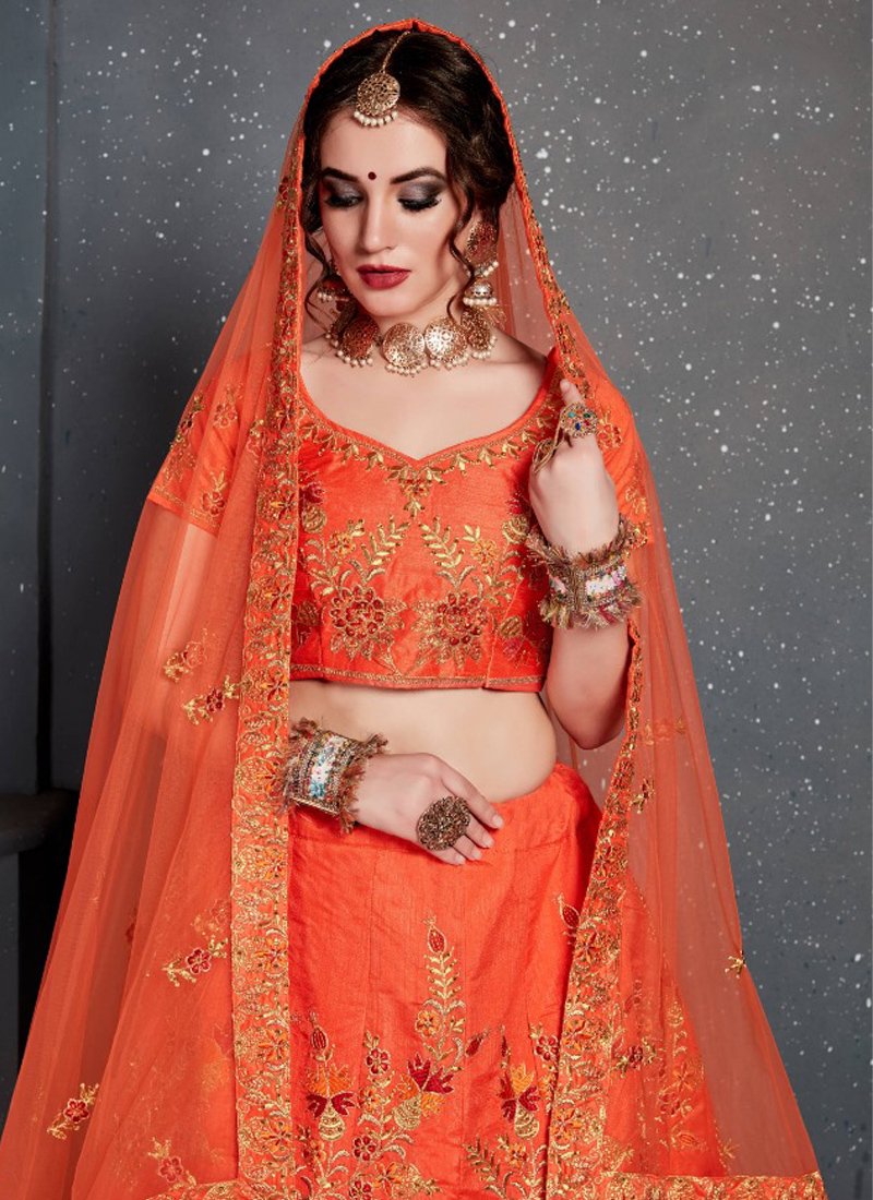 Beautiful embroidered velvet lehenga in orange