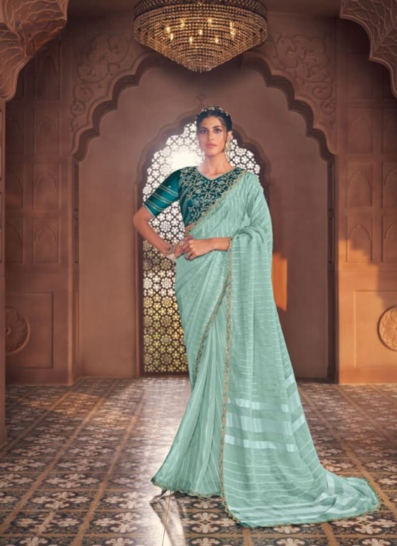 Stunning embroidered satin organza saree in teal green