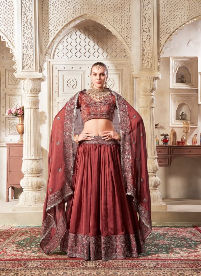 Designer embroidered flared net lehenga in brown