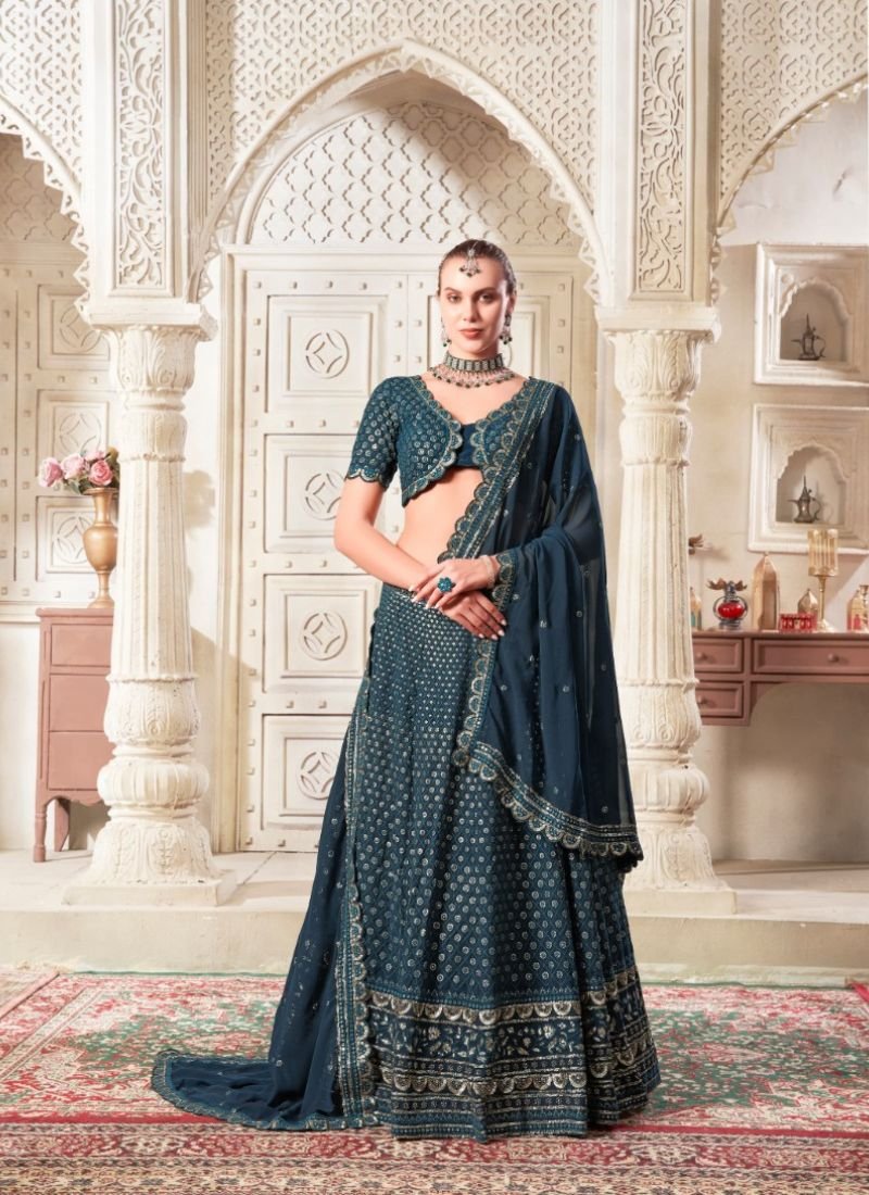 Designer embroidered flared net lehenga in navy blue