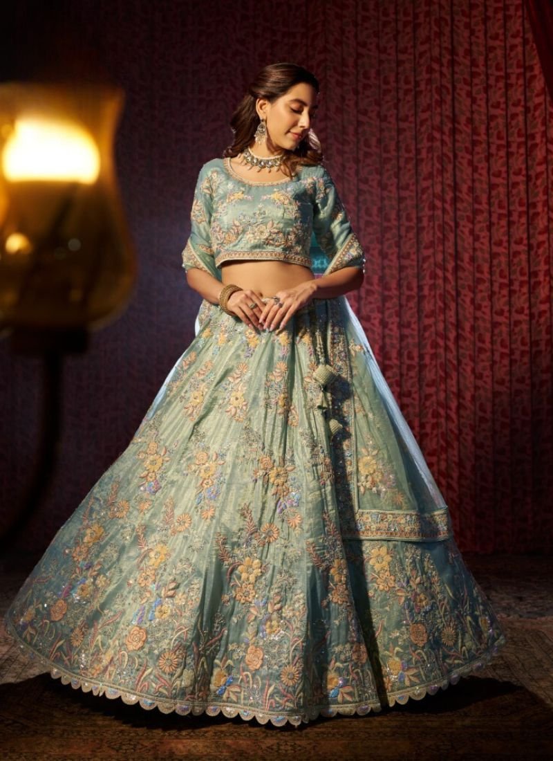 Stylish thread embroidered net lehenga choli in green