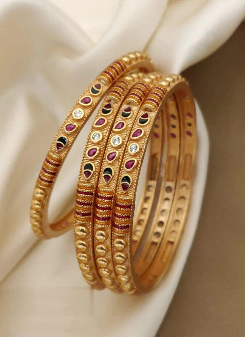 Beautiful brass gold plated meenakari bangles in magenta