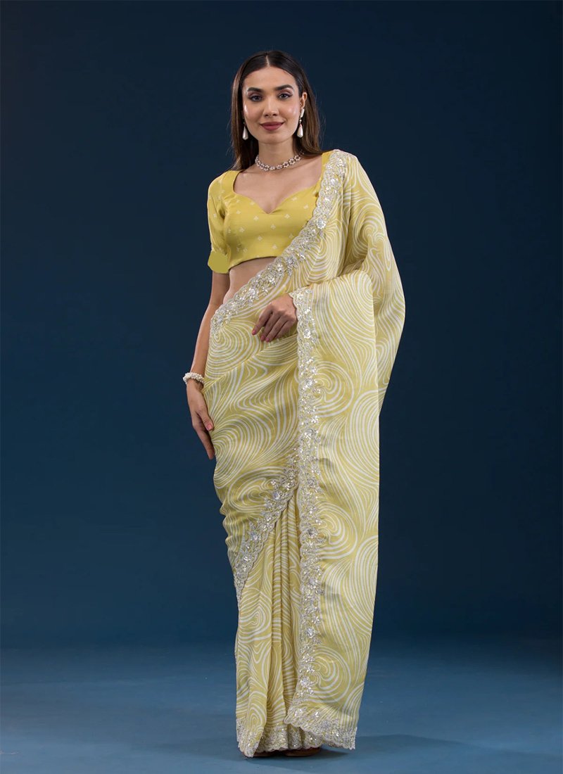 Trendy digital printed georgette saree in light yellow