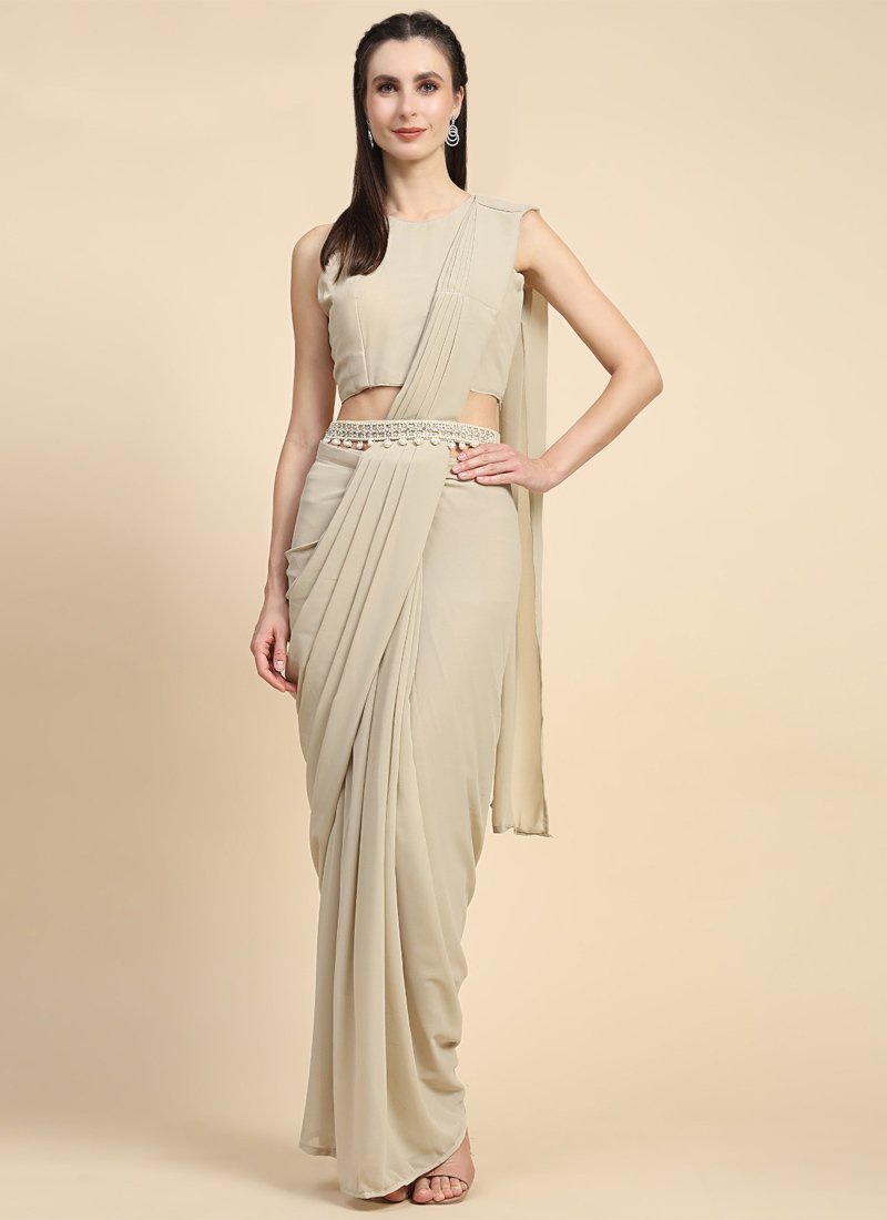 Elegant Georgette beige Saree with Solid Blouse and Moti Neck Cape