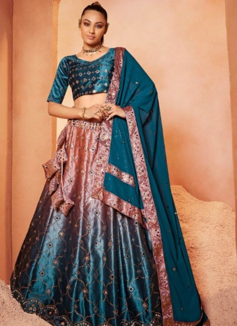 Embroidered Velvet Lehenga Choli in Teal Blue and Pink