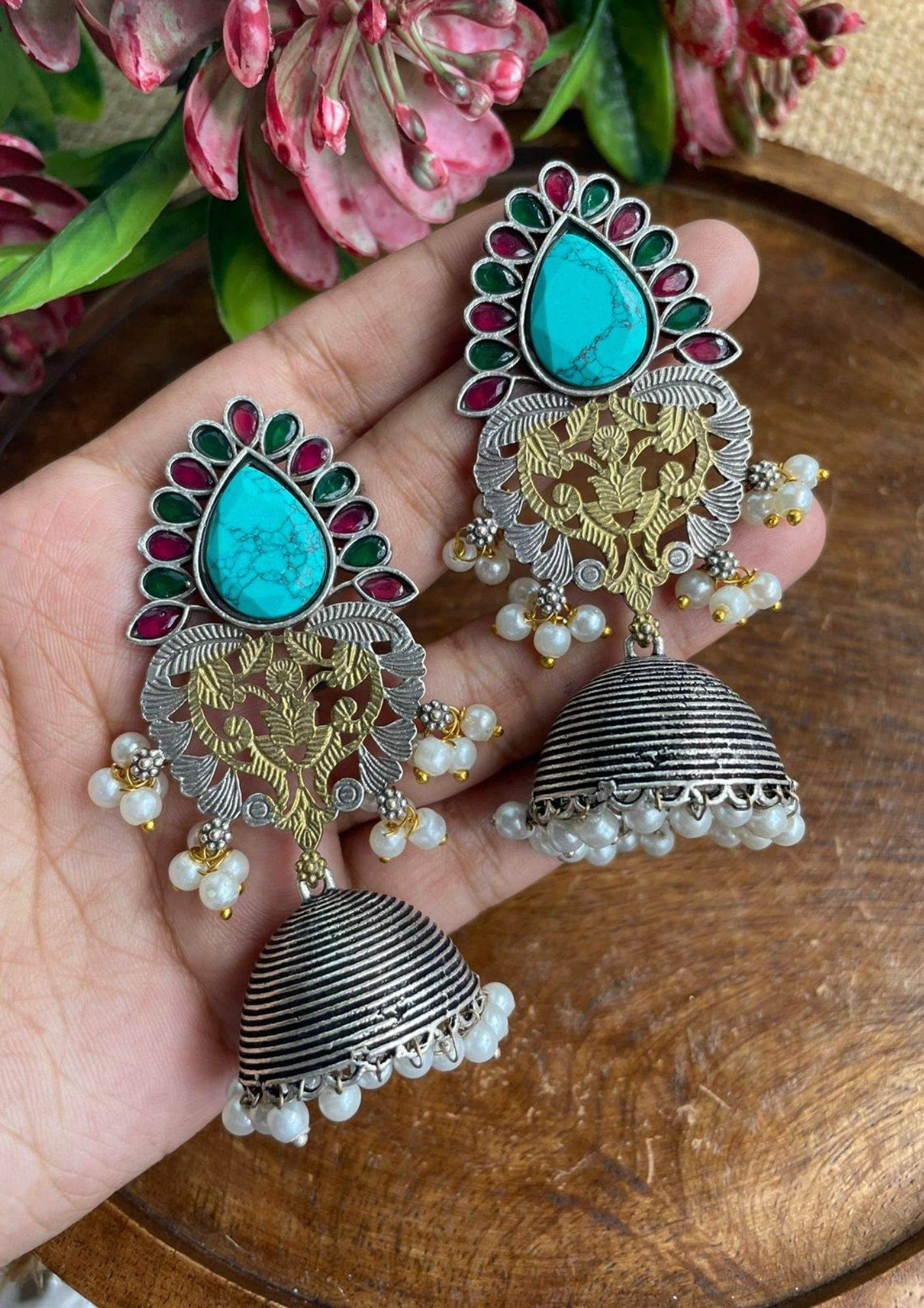 Stone Based Oxidized Jhumka Style Earrings in Sky Blue